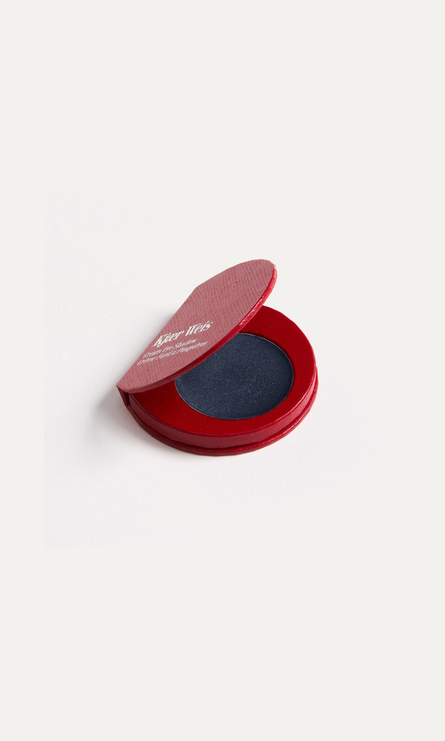 Red KW palette with lid open to show cream eye shadow