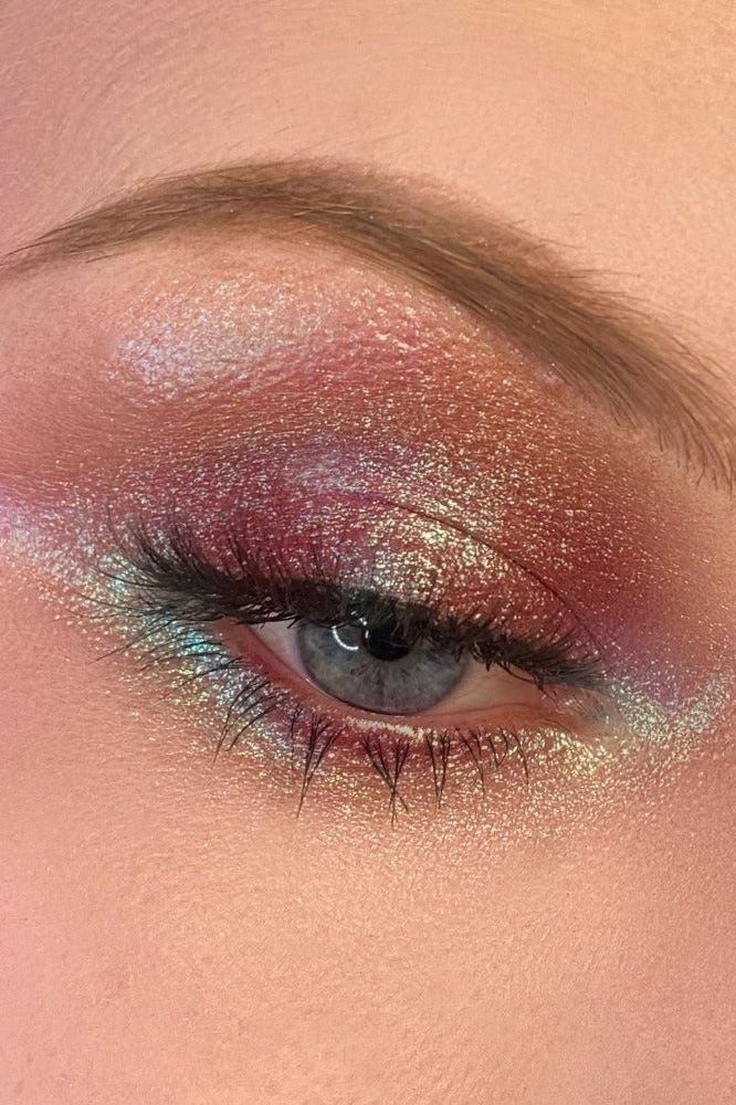 purple sangria pigmented eyeshadow on eyes swatched duochrome